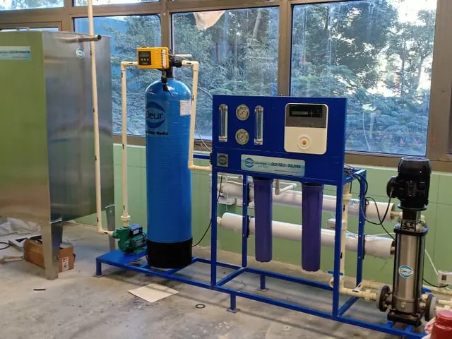 Deur RO plant with media filter and stainless storage tanks in an institutional plant room